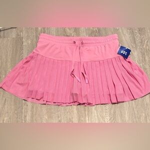 Pink pleated tennis skort